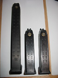 Airsoft Glock pistol magazines lined up side by side